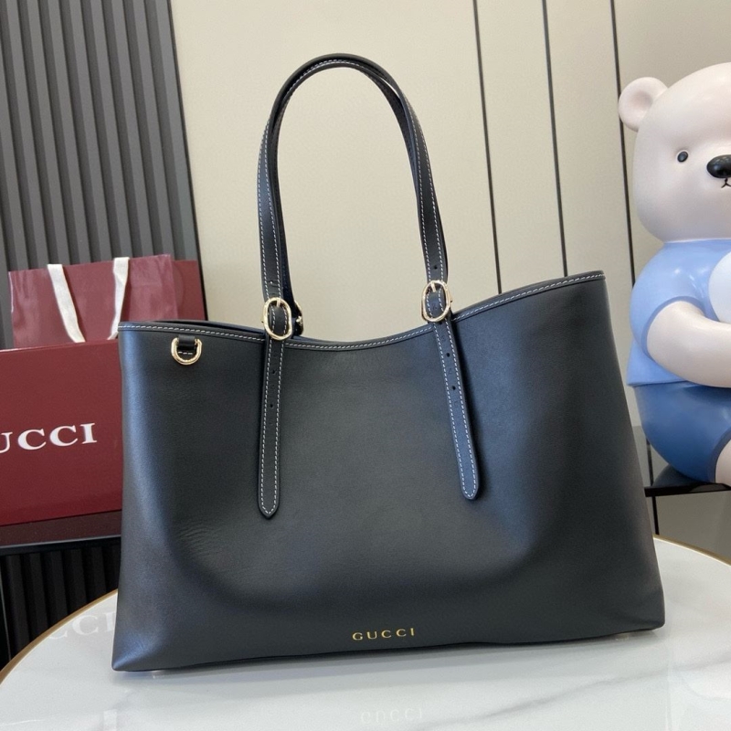 G*u*i shopping bags